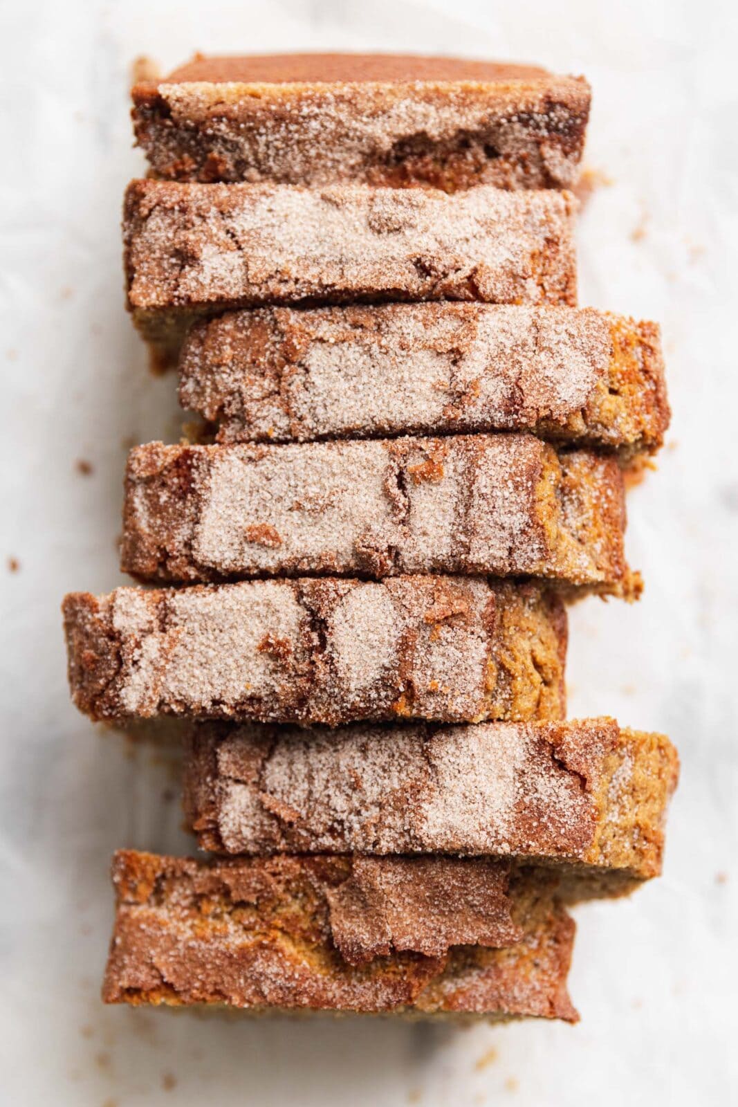 apple cider donut bread topped with cinnamon sugar