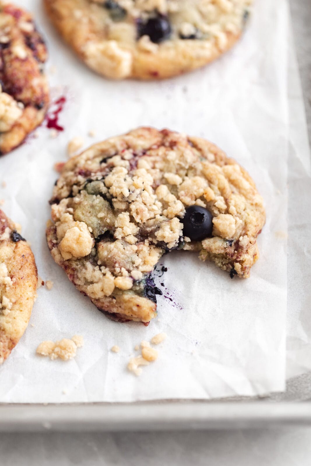 blueberry muffin cookie with a bite taken out