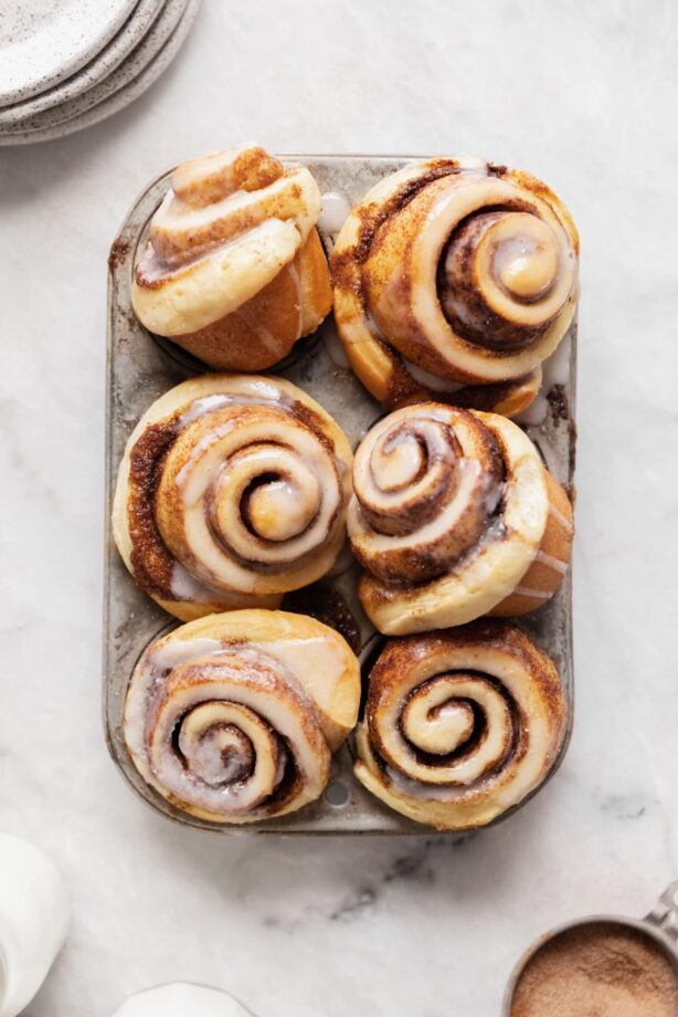 cinnamon rolls muffins in a muffin tin
