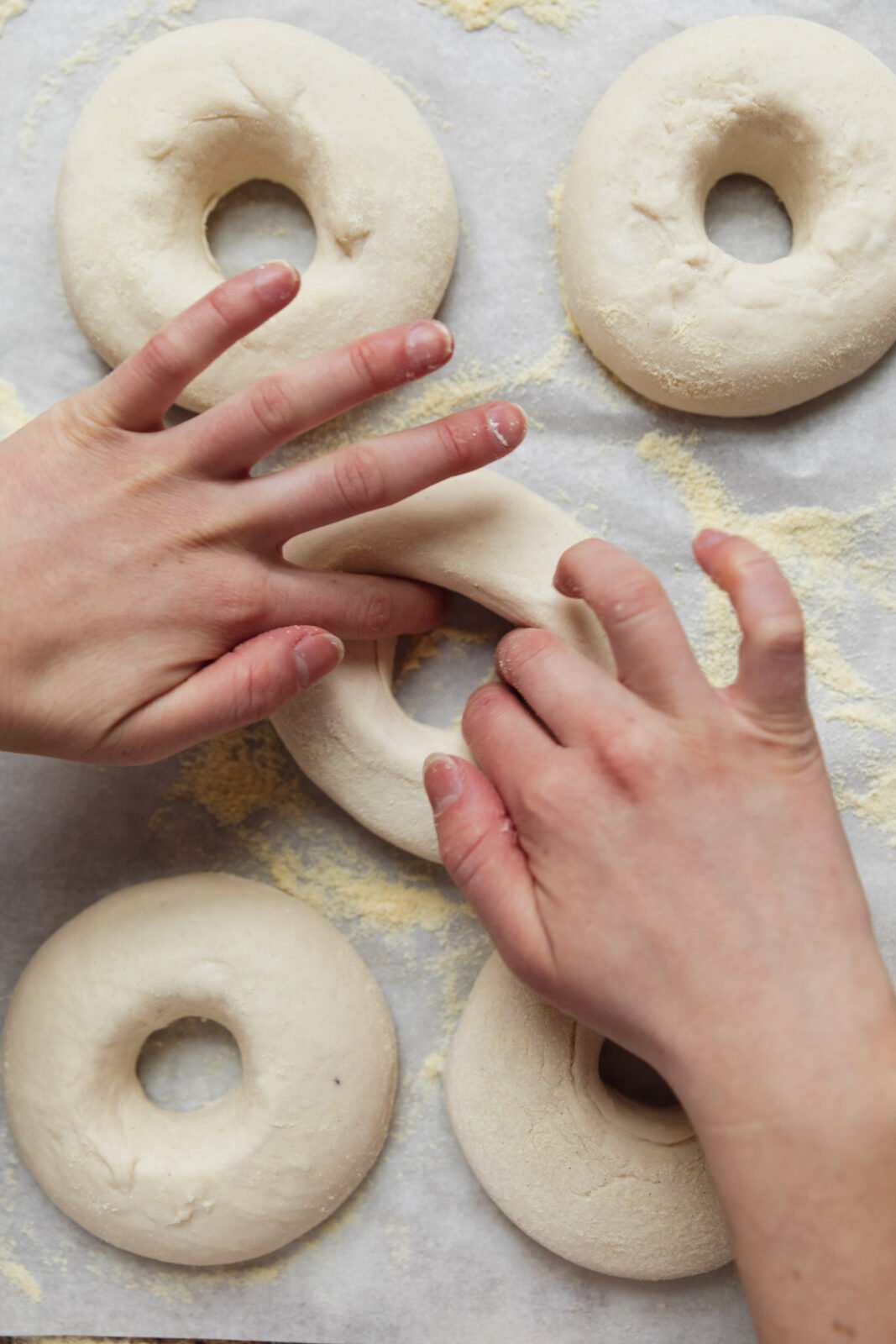 stretch out the center hole int he bagels