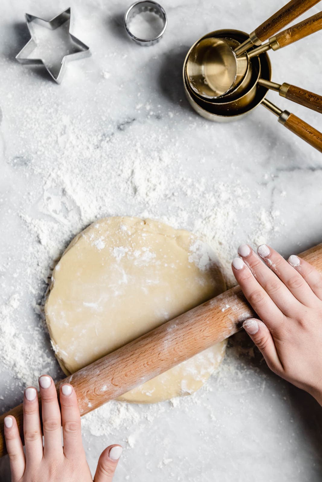 Get back to basics wtih these perfect cut out sugar cookie. Dense, and chewy, with a crispy edge and a gooey center, you won't be disappointed!
