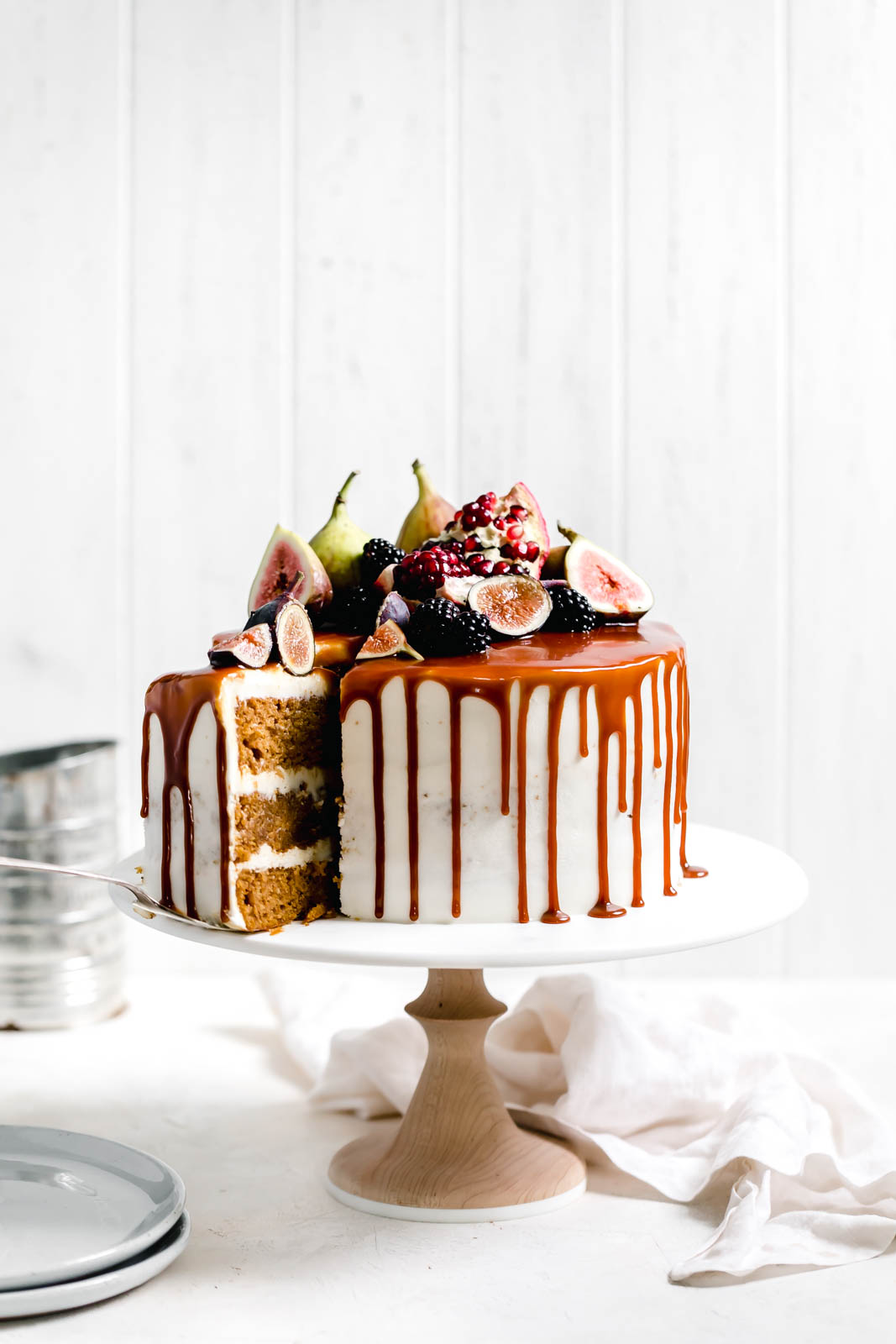 Pumpkin cake being sliced 